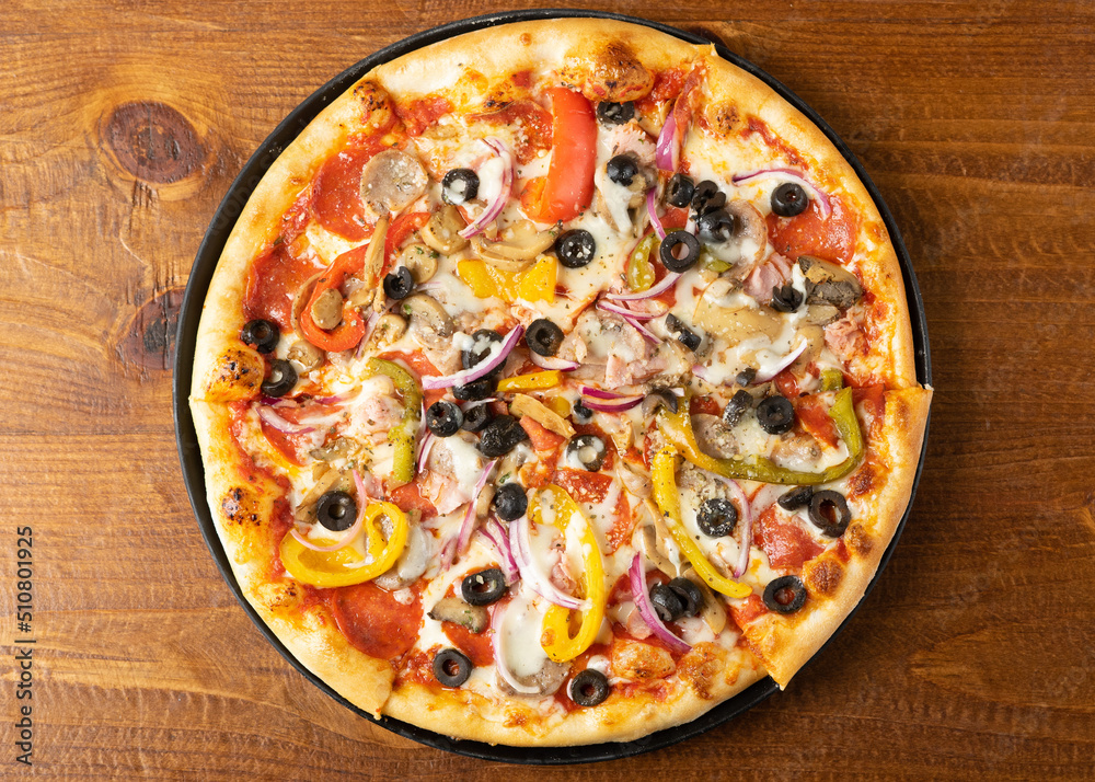 Pizza with peppers, onions and olives