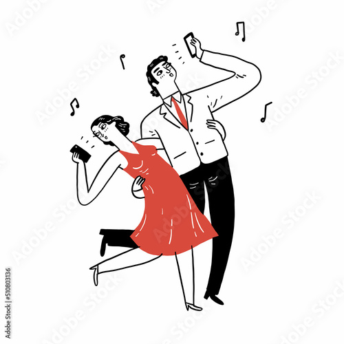 Excited young dating couple having fun dancing with songs, using on smartphones