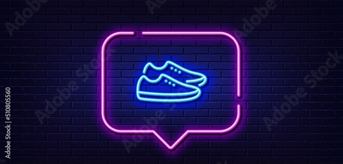 Neon light speech bubble. Shoes line icon. Sport footwear sign. Fashion sneakers symbol. Neon light background. Shoes glow line. Brick wall banner. Vector