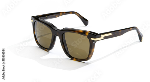 Women sunglasses in sunlight isolated on white background. Modern stylish sunglass for holiday vacation. Fashion female black leopard glasses.