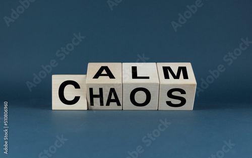 Calm or Chaos. Cubes form the words of choice Calm or Chaos.