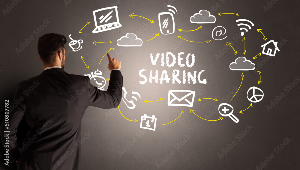 businessman drawing social media icons businessman drawing social media icons