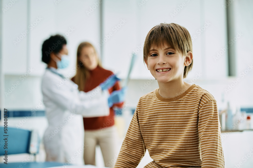 Portrait of happy kid at pediatrician's office looking at camera. Portrait of happy kid at pediatrician's office looking at camera.