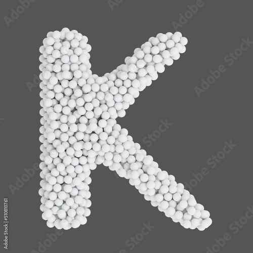 Letter K made of white balls, isolated on gray background, 3d rendering