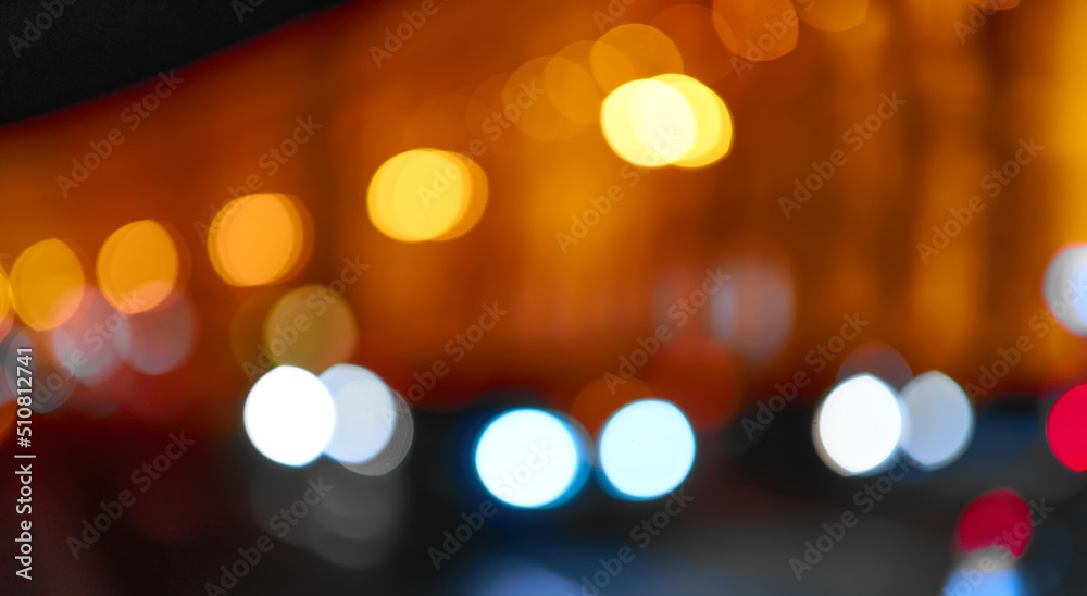 Texture blur, blurred highlights lights. Evening and night light on city streets.