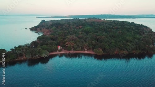 Drone approaching the shore of Banda Island beach, Uganda, in the island Ssese archipelago, Lake Victoria. 4k high quality footage photo