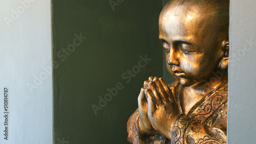Praying Buddhist Statue