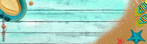 Topview Beach Accessories Background on Sand and Blue Wood