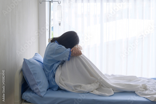 Photos A despondent Asian woman patient
