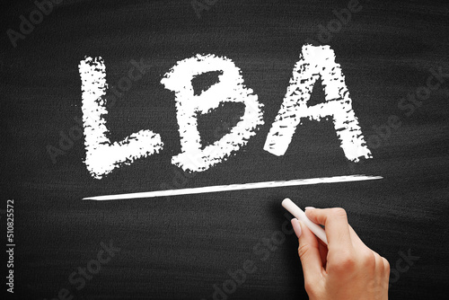 LBA - Logical Block Addressing is a common scheme used for specifying the location of blocks of data stored on computer storage devices, acronym text on blackboard photo