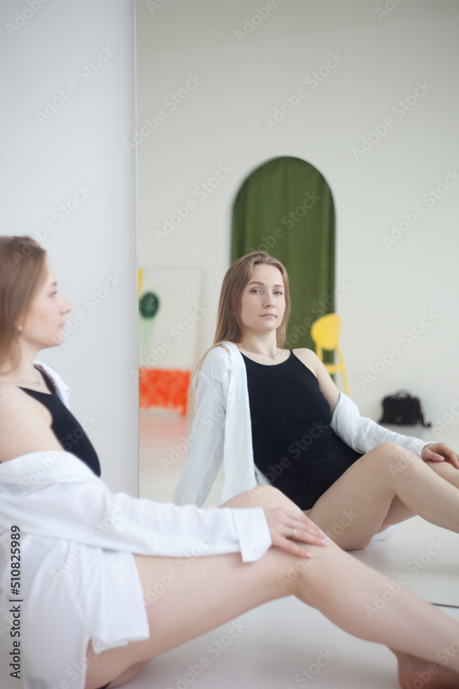 Fototapeta premium woman exercising with dumbbells