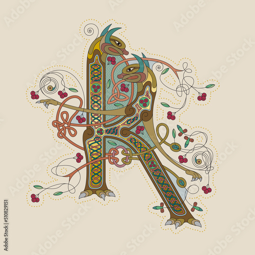 Illuminated, Medieval Initial Letter K combining animal body parts from a Dogs, tendrils and endless Celtic knot ornaments