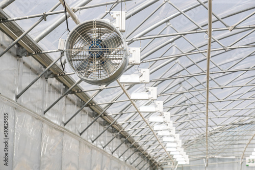 Fan in modern agricultural greenhouse. Greenhouse ventilation system