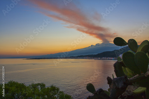 Etna in eruzione al tramonto photo