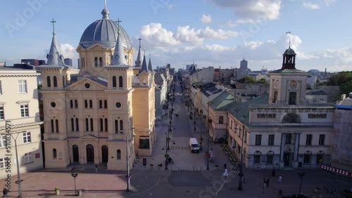 Łódź city on a sunny day. Characteristic places, buildings and streets. Piotrkowska Street from the bird's eye view.
