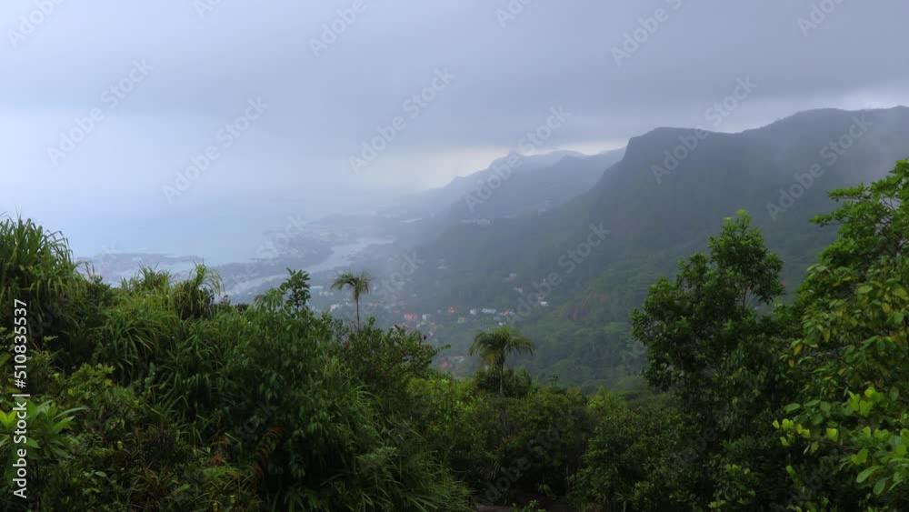 View of Mahe Island in fog, Seychelles View of Mahe Island in fog, Seychelles