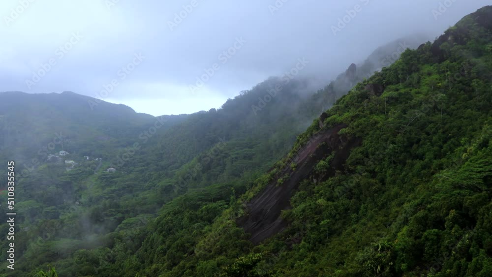 View of Mahe Island in fog, Seychelles View of Mahe Island in fog, Seychelles