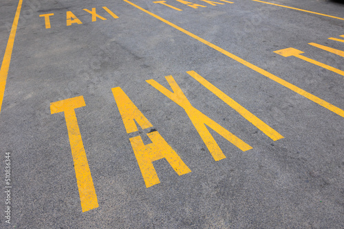 various taxi writings on the asphalt