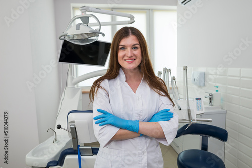 Portrait of a young beautiful female dentist