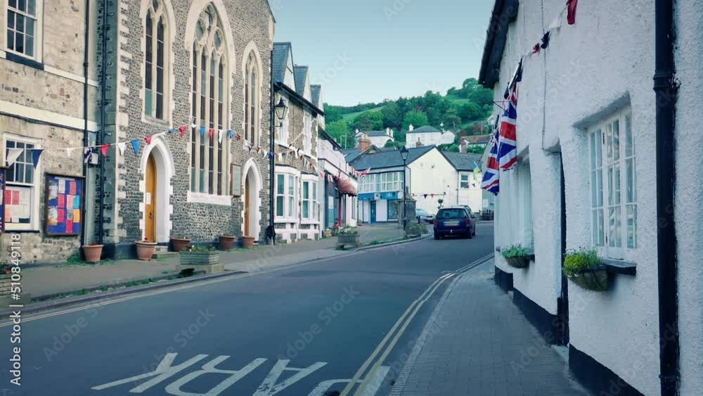 Rural English Village With Car Passing Through Rural English Village With Car Passing Through