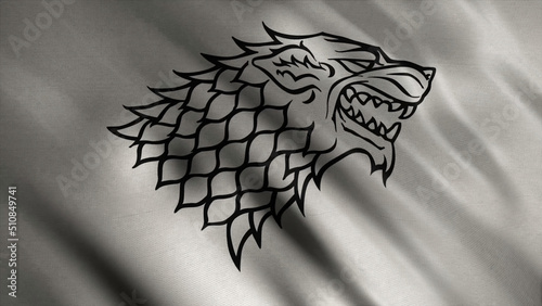 Abstract developing fabric of flag. Animation. Silhouette of wolf with black contours on background of developing silver flag. Emblem of house Stark. Concept of series Game of Thrones photo