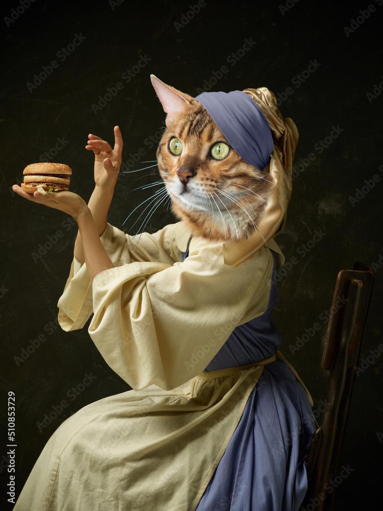 Graceful female model like medieval person in vintage clothing headed by cat  head isolated on dark retro background. Comparison of eras, artwork Photos  | Adobe Stock