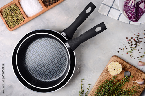 frying pan top view with cooking ingridients