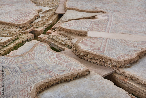 Roman mosaic tiles and hypocaust in La Olmeda village. Spain photo