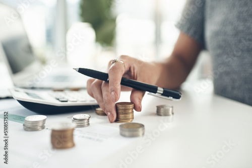 How financially savvy are you. Closeup shot of an unrecognisable businesswoman calculating finances in an office.