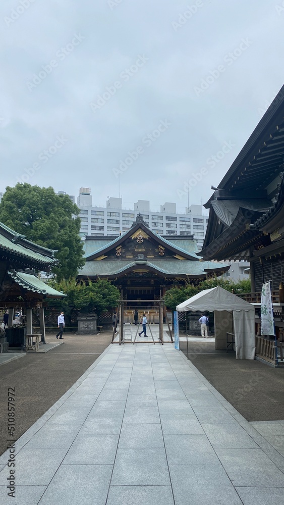 Path to the main enshrinement at “Yushima Tenmangu”, ancient historic Japanese shrine established in year 458, very renowned landmark in central downtown Tokyo, Ueno, shot taken year 2022 June 14th