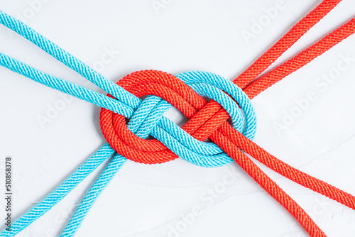 Infinity sign shape made from colored cords