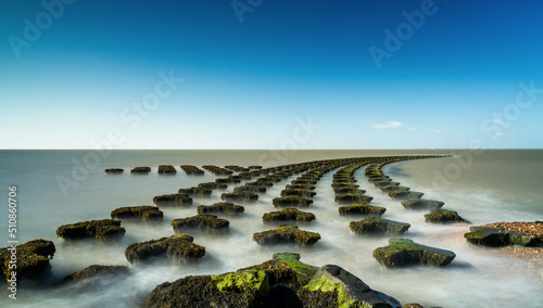 view of the sea defenses at Cobbolds Point near Felixstowe on the North Sea coast of England photo