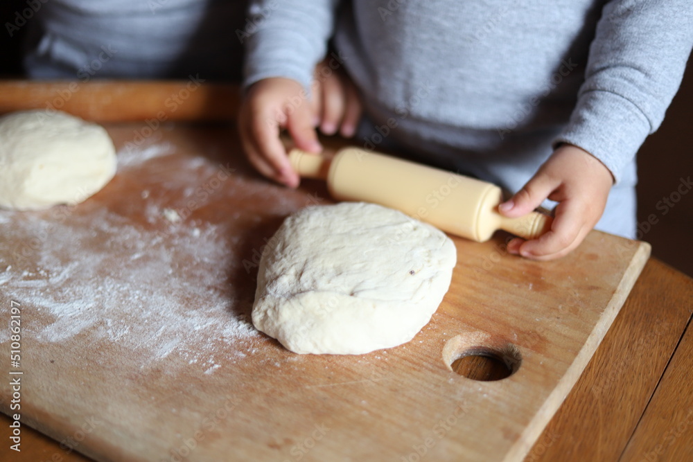 person kneading dough person kneading dough