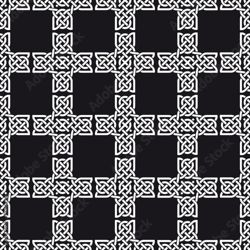 Seamless Celtic knot pattern including medieval crosses and circles in black and white (variation n° 4)