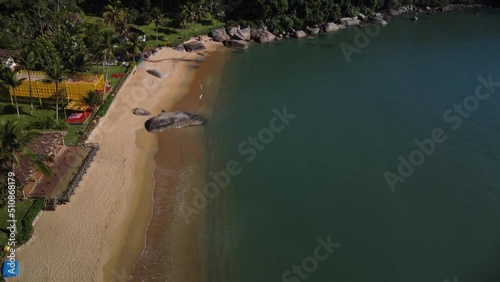 Aerial view to a small beach with the atlantic forest at the coast of Paraty, Rio de Janeiro - Brasil photo