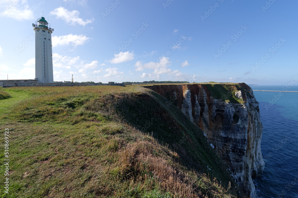 Coastal path and  lighthouse of the Antifer cape in Normandy coast