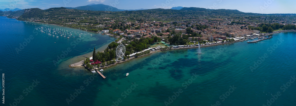 Panorama Bardolino town on Lake Garda aerial view. Coastline of Lake Garda, Italy. Aerial panorama of Bardolino town.