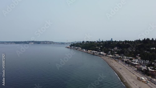 Wallpaper Mural Drone shot slowly revealing the towering Seattle skyscrapers from Alki Beach. This beautiful 4K cinematic cityscape was filmed using a DJI Mini 2 drone. Torontodigital.ca