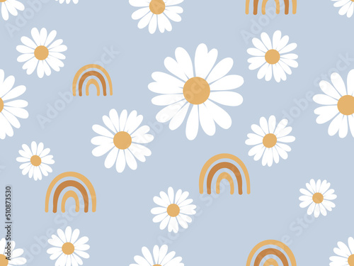 Seamless pattern with daisy flower and gold rainbows on blue background vector. Cute childish print.
