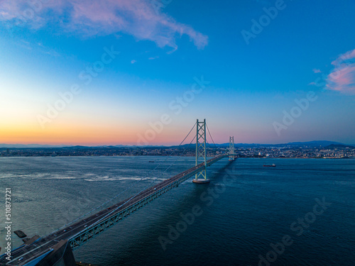 Sunset over world's longest suspension connecting Awaji Island with Akashi and mainland Japan