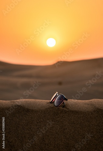 Wayfarer Sunglasses In The Sand Dunes of Dubai © Isaac