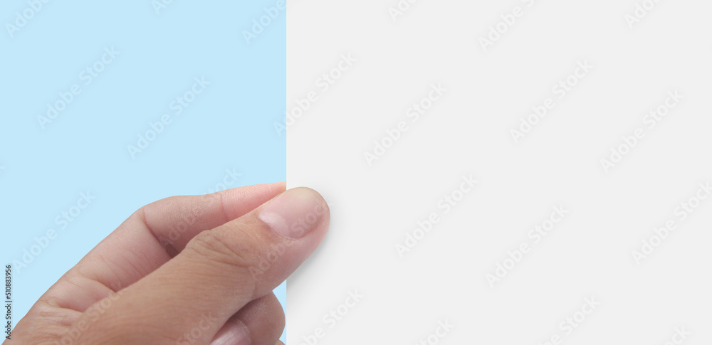 Hands holding paper blank for letter paper Hands holding paper blank for letter paper