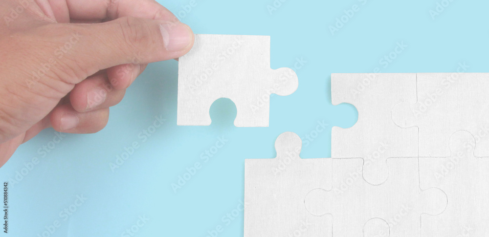 Connecting jigsaw puzzle. Business solutions success Connecting jigsaw puzzle. Business solutions success