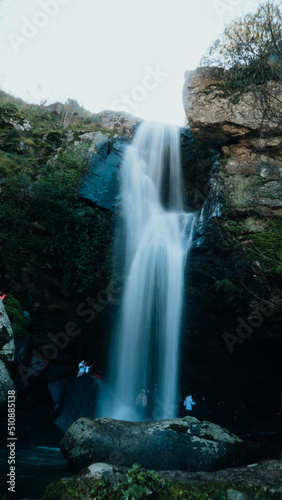 Landscape of a waterfall with silky water. Long exposure photography