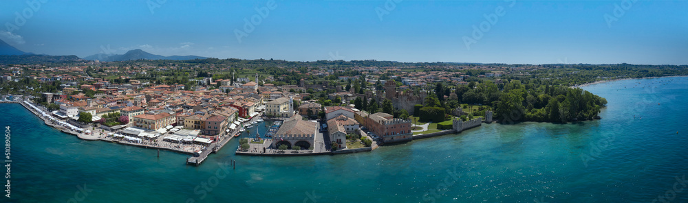 Aerial panorama of Lazise town on Lake Garda Italy. Aerial view of Lazise city, Verona. The coastline is the historical part of the city of Lazise.