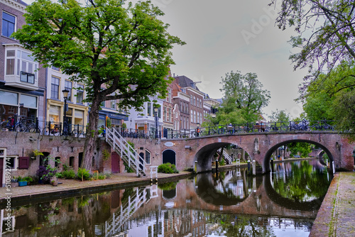Utrecht, The Netherlands - June 07 2022: A bridge over the Oudegracht canal in summer