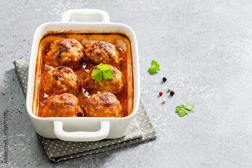 Teriyaki sauce meatballs in baking dish. Top view, copy space, flat lay.