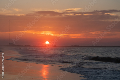 Ocean waves at sunrise off the shore of Cape May   New Jersey USA