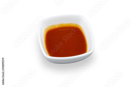 Tomato sauce in a small cup isolated on white