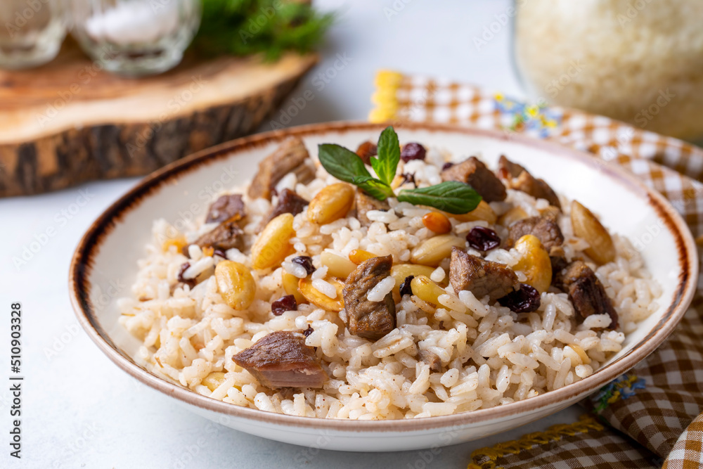 Traditional delicious Turkish food; rice pilaf with pine nuts and currants (Turkish name; bademli ic pilav or pilaf)